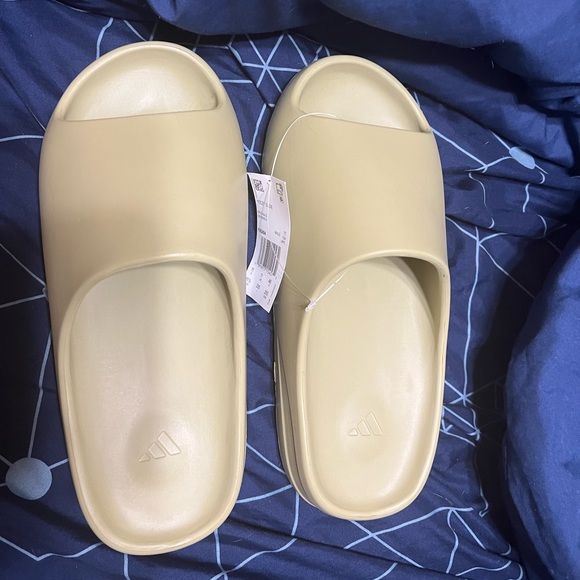 Yeezy slides never worn , have extra pair.  Will ship main image 4
